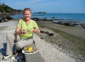 Eating oysters in Cancale, Brittany, France
