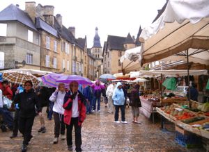 Sarlat market in the rain, Dordogne, France